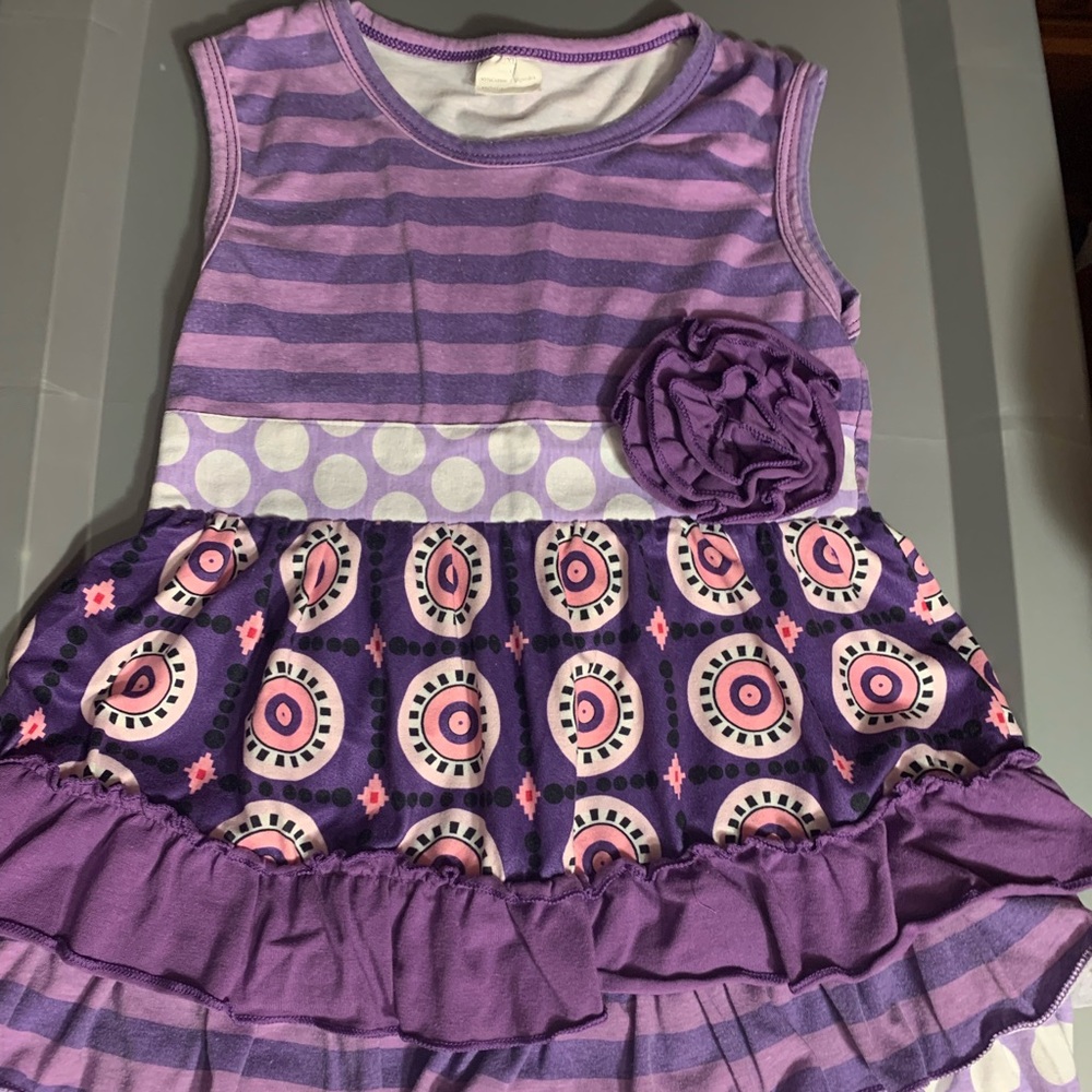 Two piece ruffle outfit.  Size 6-7T sleeveless top with shorts.